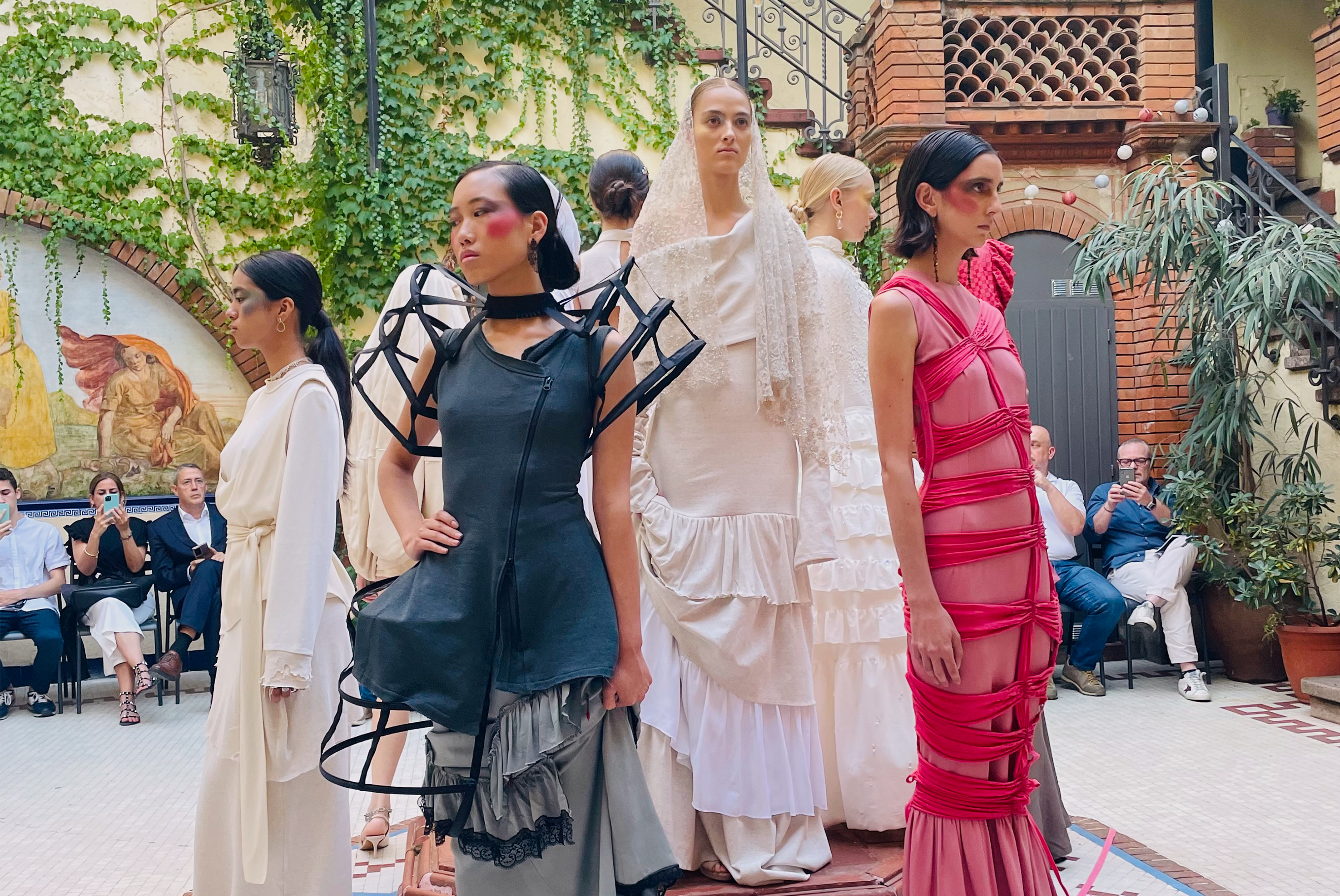 Nine people pose at Bunka Fashion College during the Naia team’s presentation